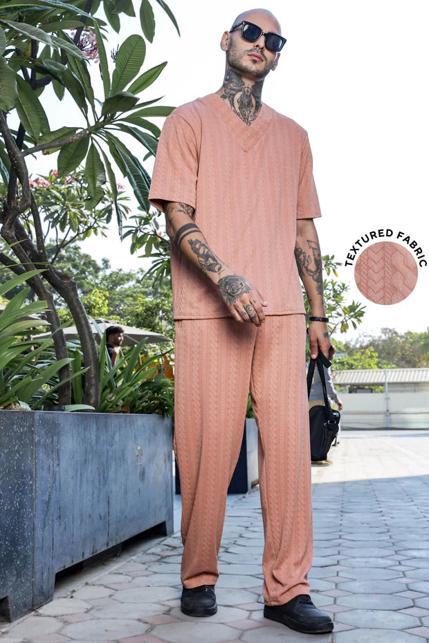 01_53472cdd-fc9a-4a46-9d9c-eb275e7261ac.jpg Unisex Brown Textured Oversized V-Neck Tee & Trackpant Co-ord Set - Image 1
