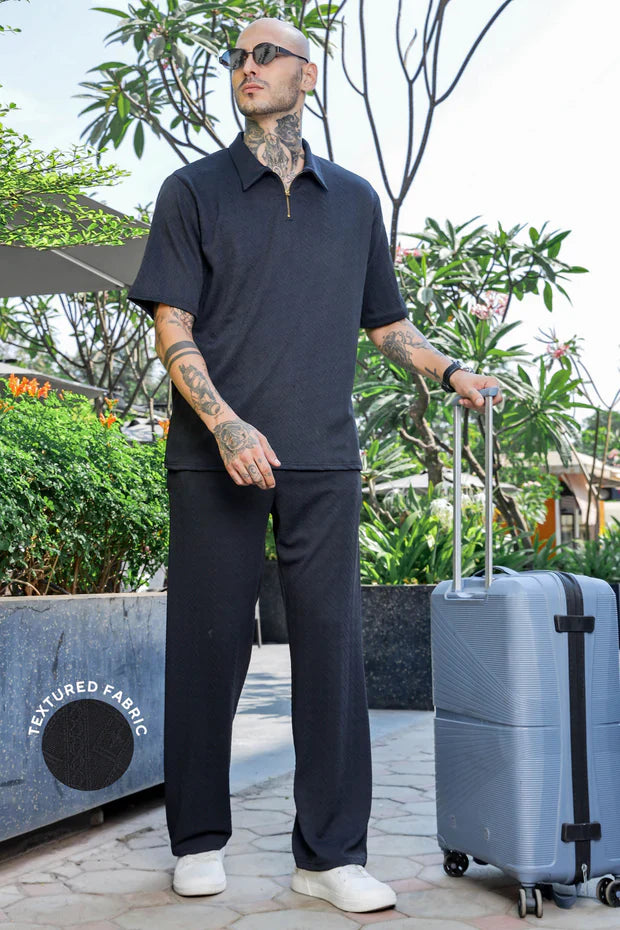 01_97acc519-1bdc-40be-a52b-e8cb7fcd615a.jpg Unisex Black Textured Oversized Polo Neck Tee & Trackpant Co-ord Set - Image 1