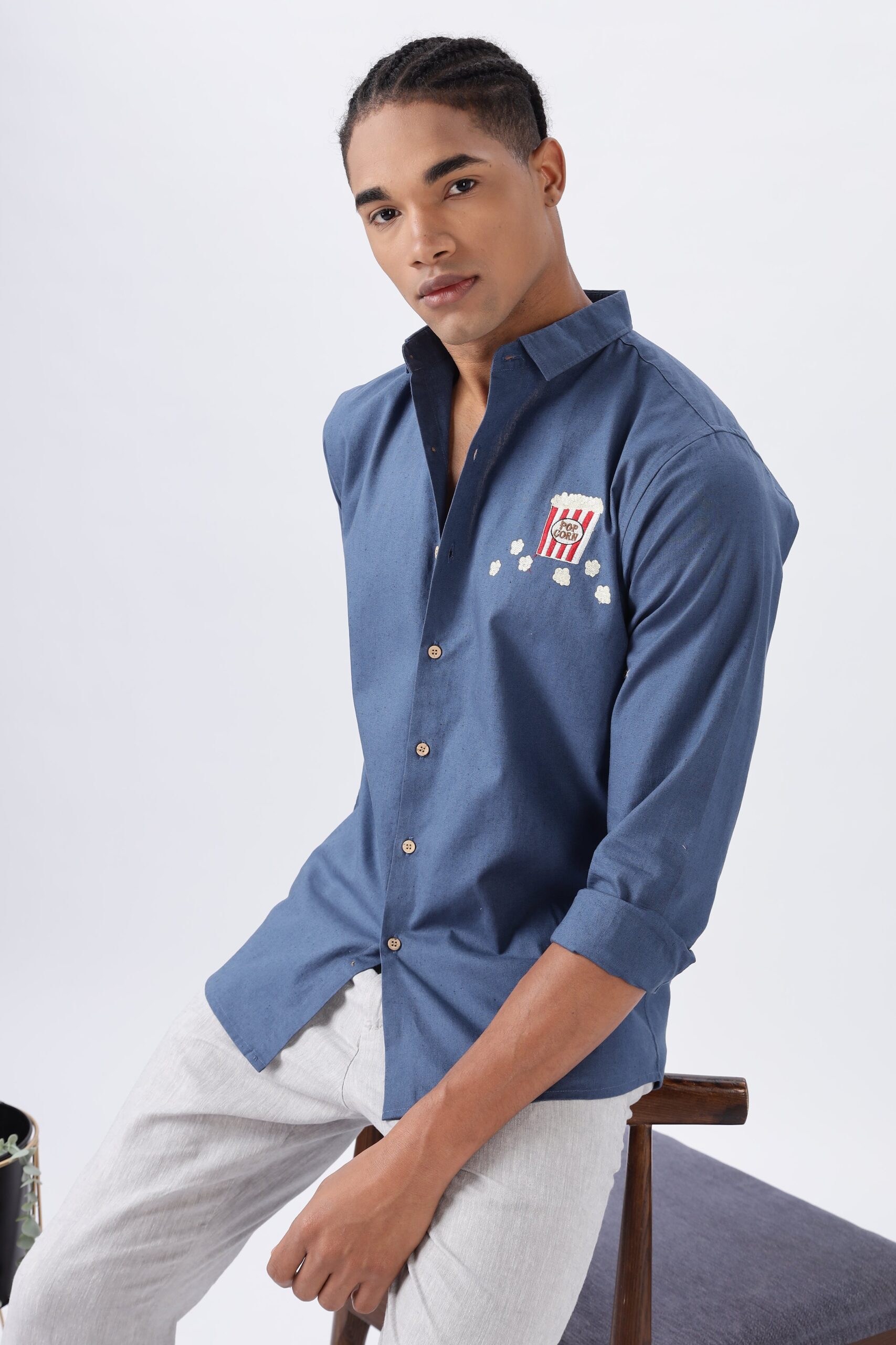 1L9A1865-scaled-1.jpg Popcorn and Plot Twists Navy Fun Embroidered Shirt - Image 1